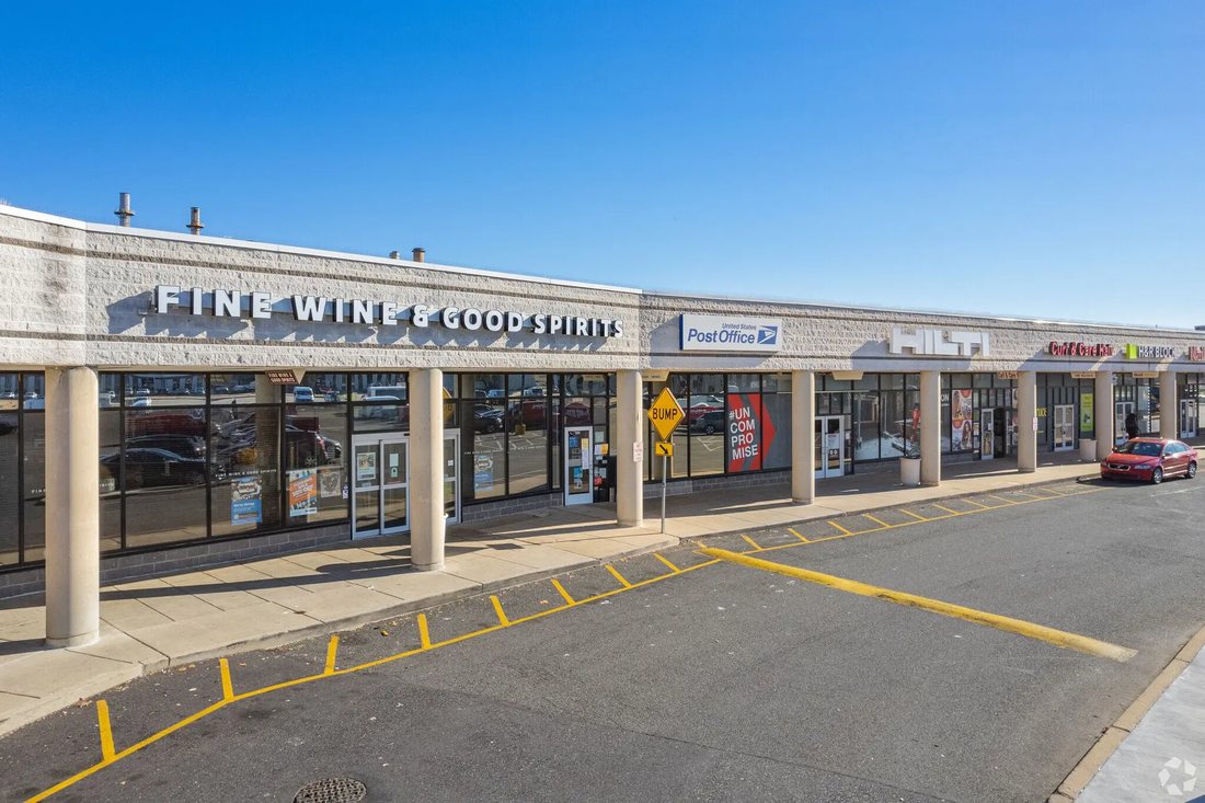 Fine Wine & Good Spirits, Post Office and Hilti storefronts
