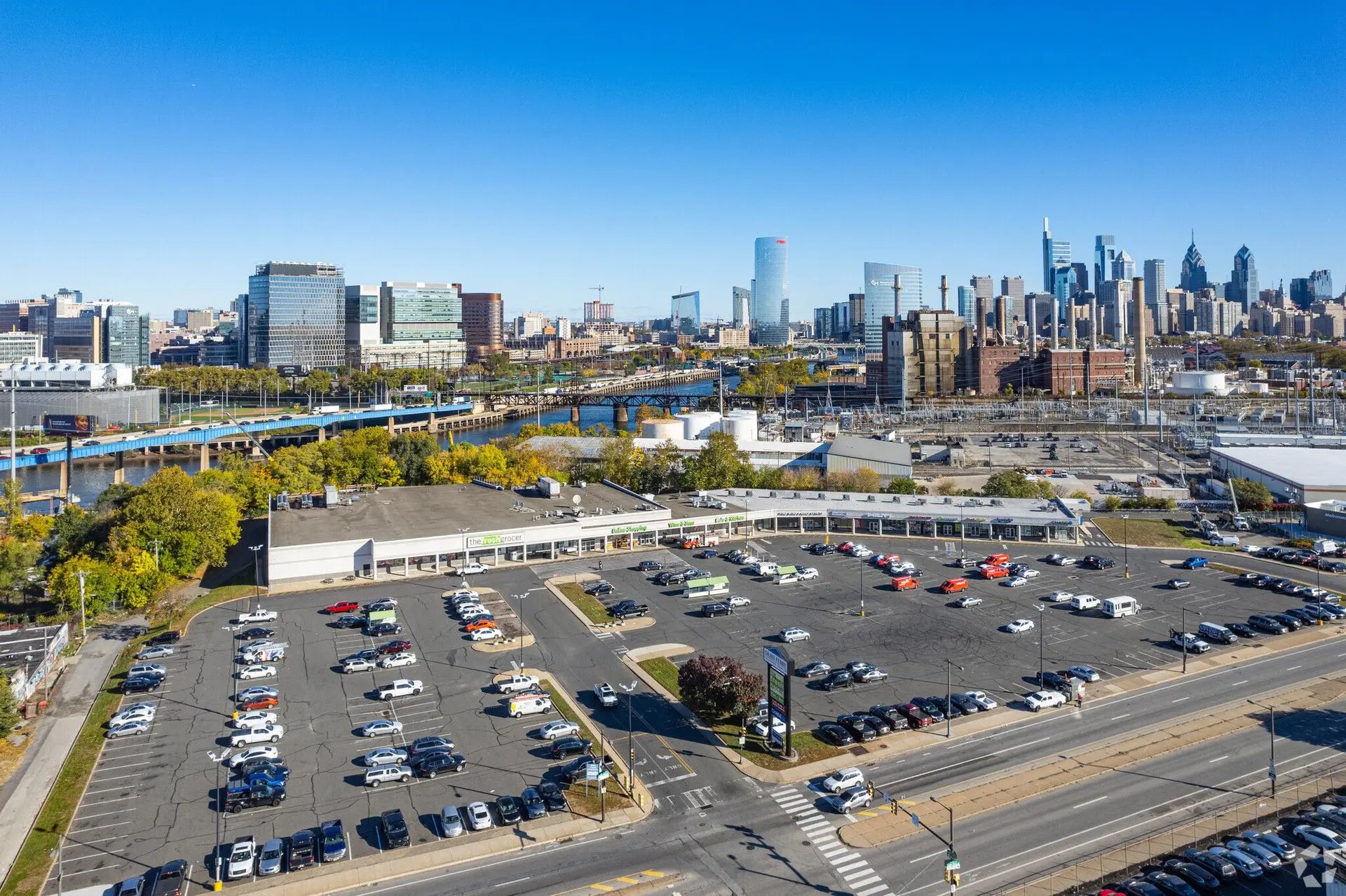 Aerial view of Gray's Ferry Shopping Center with the Philadelphia skyline beyond